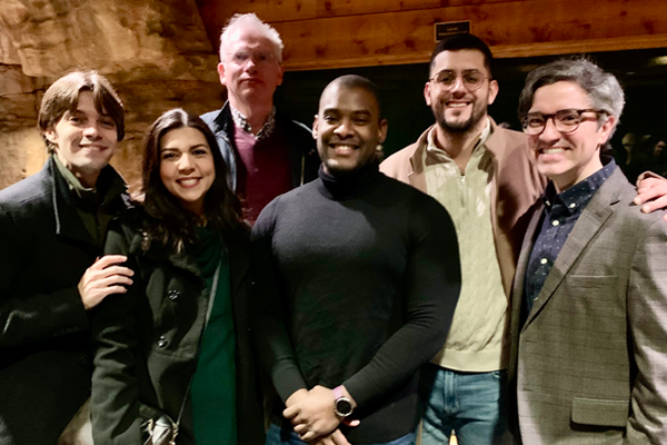 Residents and faculty at the holiday party