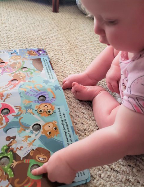 baby with book