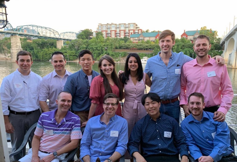 Group photo of all residents in downtown Chattanogga with the river as a brackdrop