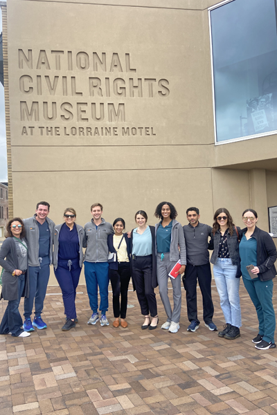 Group of residents outside the Civil Rights Museum in Memphis during the day