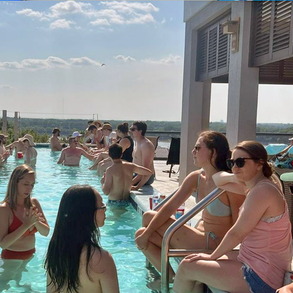 Residents sitting in a pool