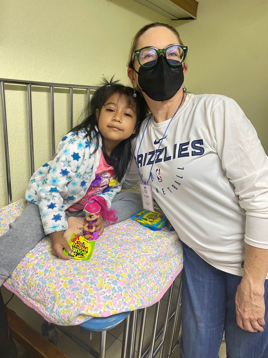 Doctor with child patient awaiting surgery.