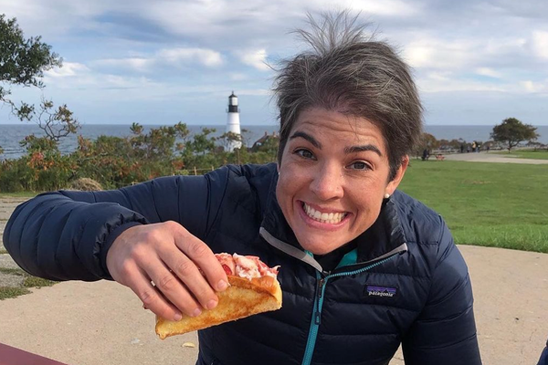 Resident eating a taco outdoors