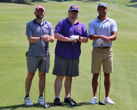 Three male residents on the golf course