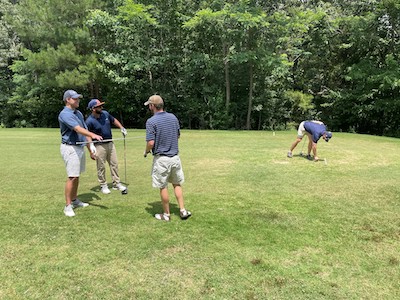 Residents at the golf tournament