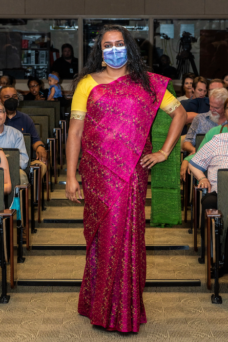 Resident walking the aisle at graduation