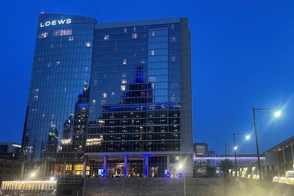 Outside view at night of the 2023 conference venue