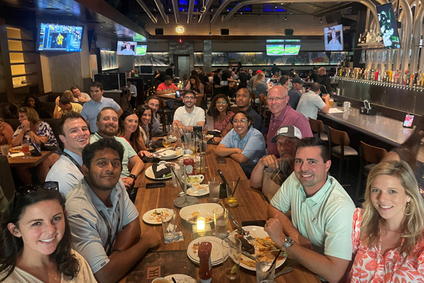 UTHSC residents and faculty eating in a restaurant