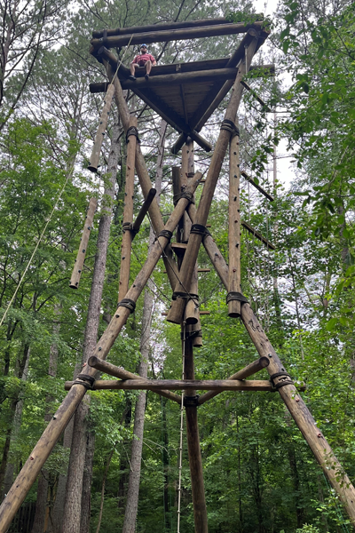 residents at the top of the ropes course