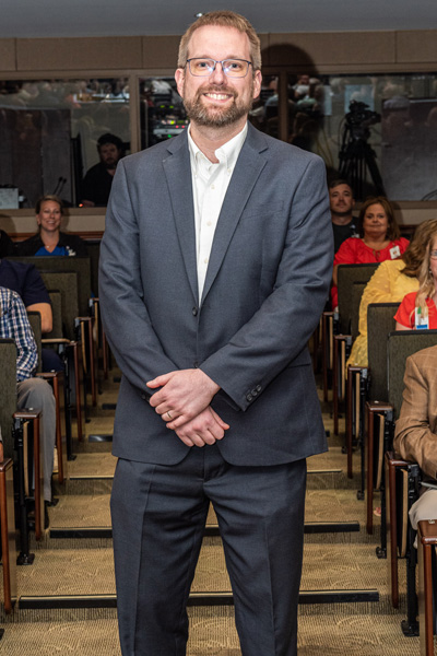 Resident in graduation audience aisle