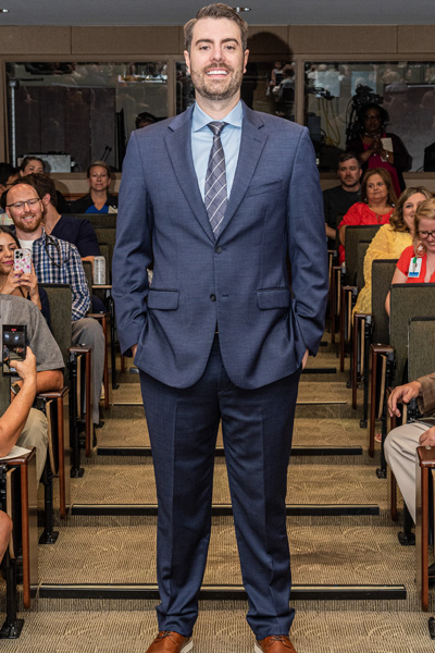 Resident in graduation audience aisle