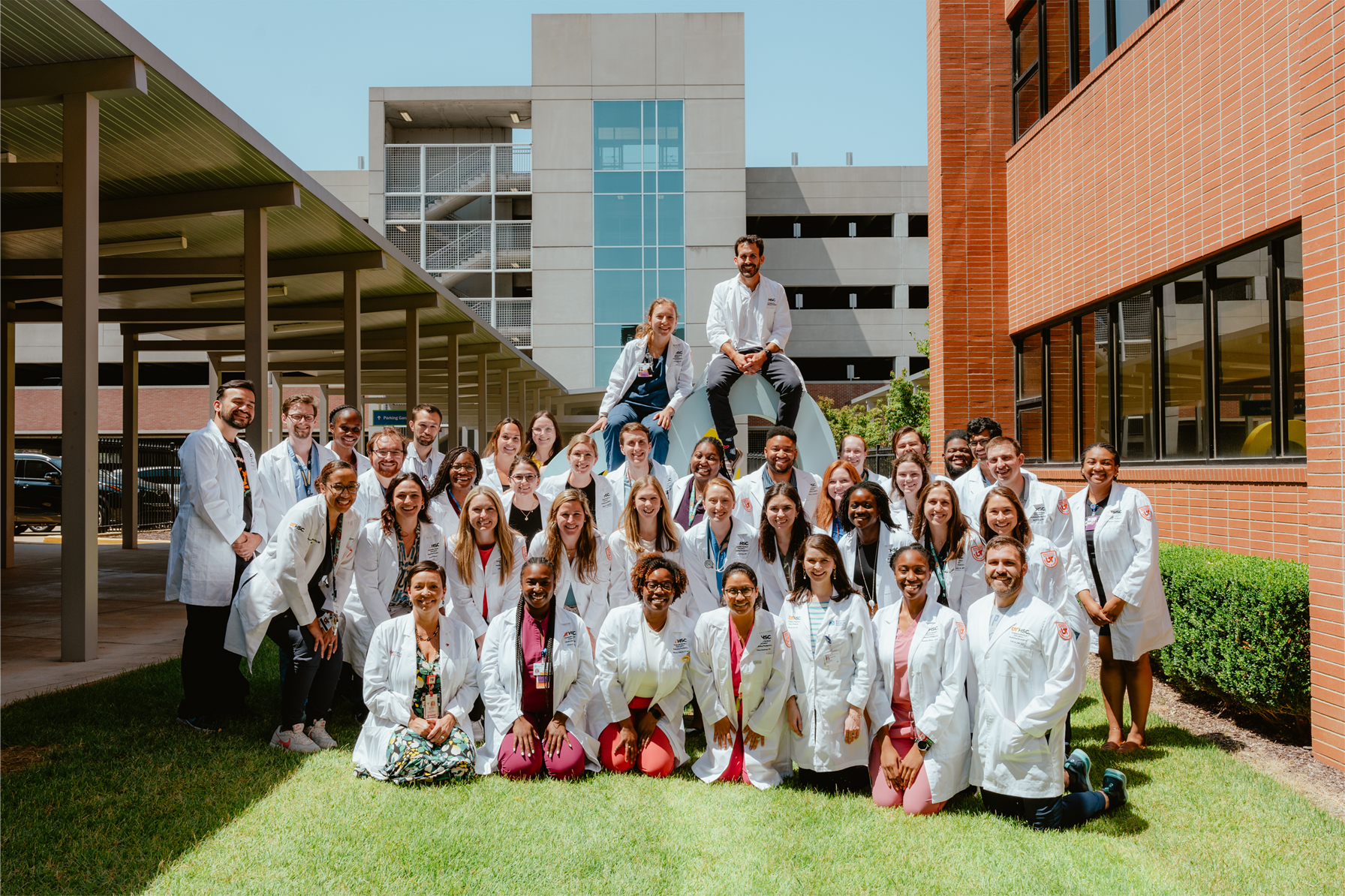 Group photo of residents in an outsides setting