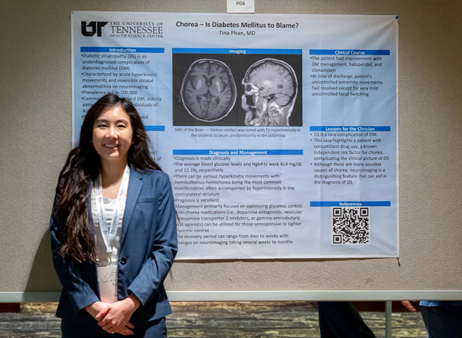 Dr. Phan at her presentation poster