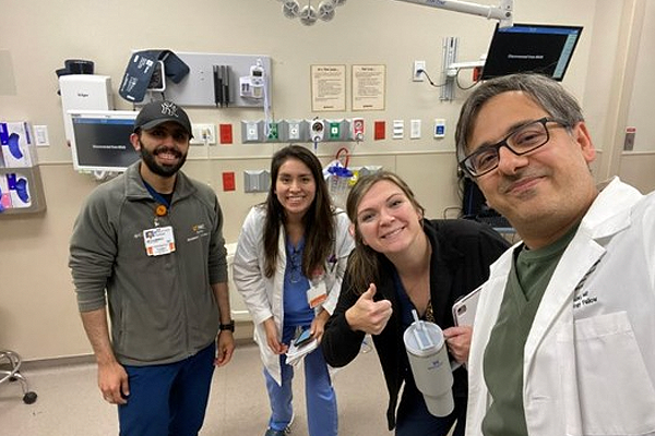 Four fellows in a hospital setting