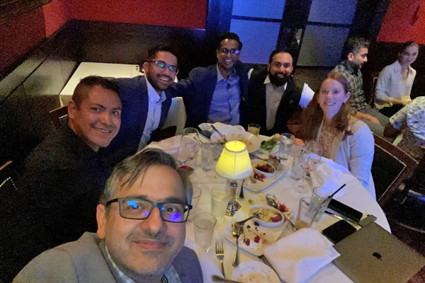 Fellows at a dinner table