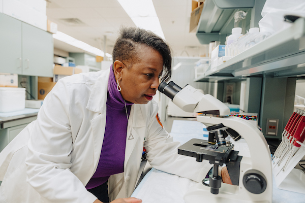 woman at microscope