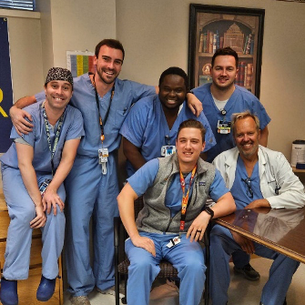 Group of male doctors in an indoor setting