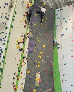 Wall climbing at annual fellowship retreat