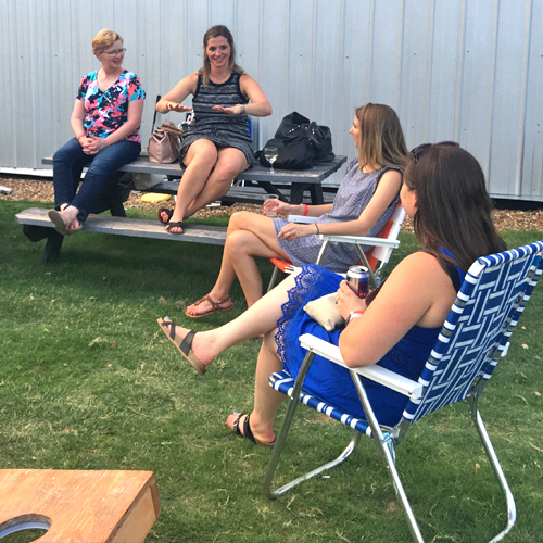 Female residents sitting outside