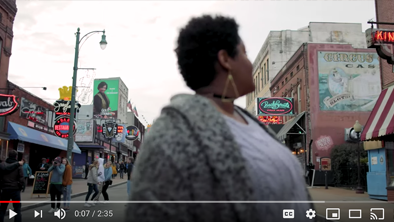 Lady overlooking Beale Street