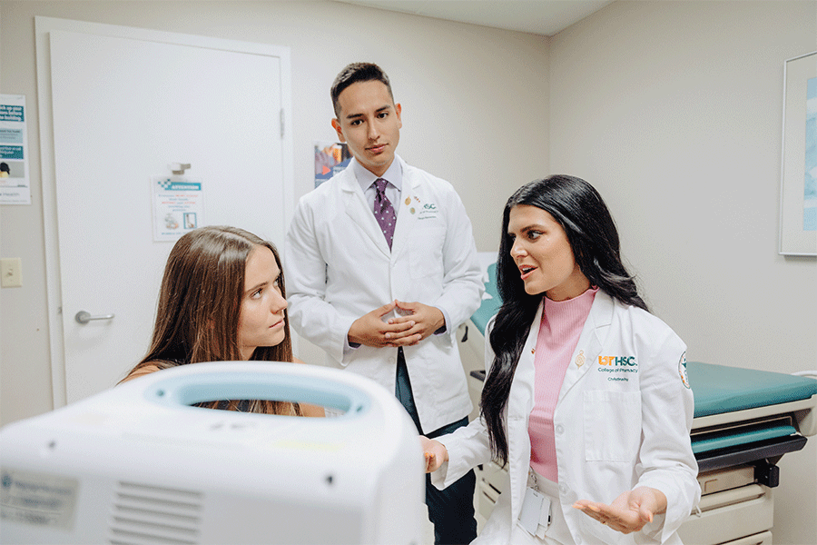 Pharmacy students in a medical office setting.