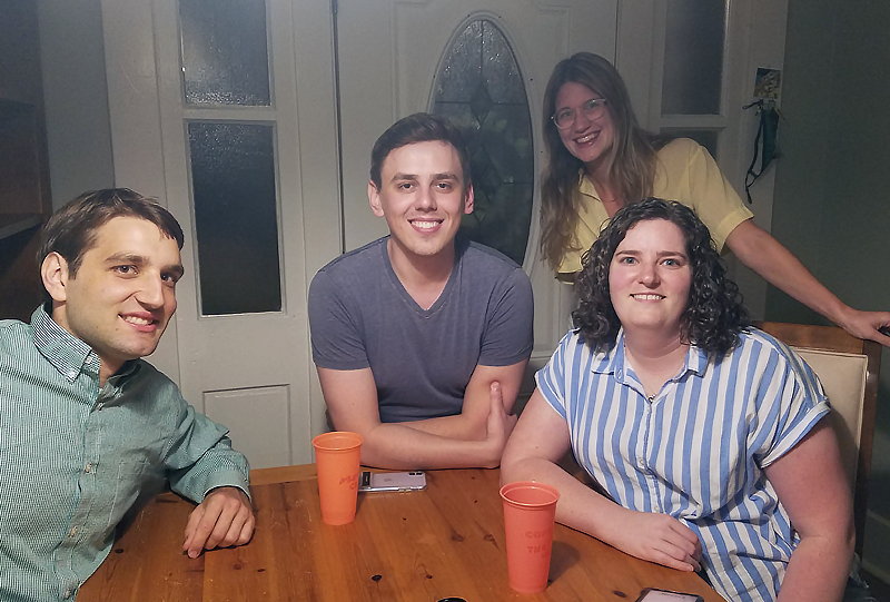 Four residents sitting around a table