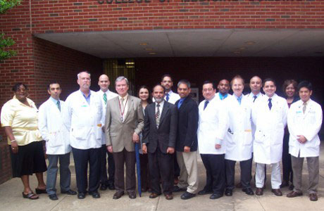 Faculty and fellows inside the Coleman Building