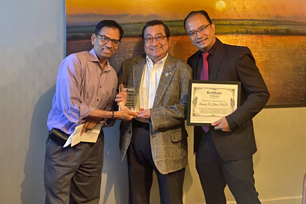 Dr. Muthiah, Dr. Friere, and Dr. Shrestha at graduation