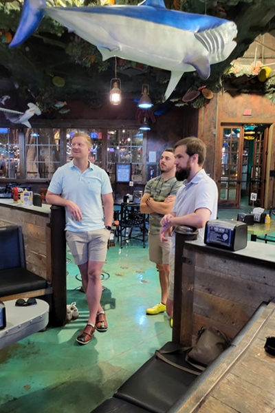 Residents bowling in the Bass Pro Shop