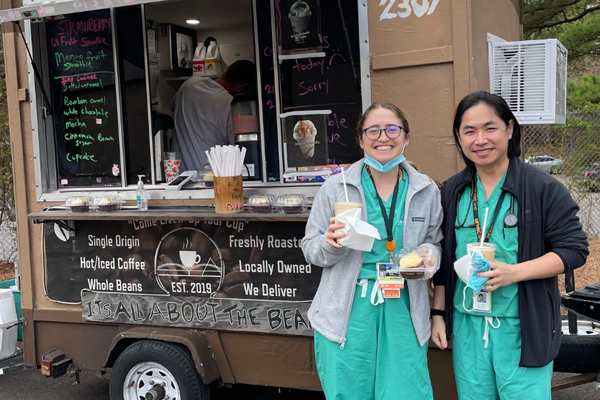 Residents getting drinks at a coffee truck