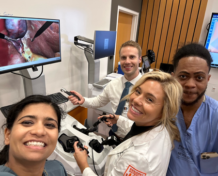 Group of four residents in the sim lab