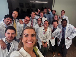 Group of residents in white coats 