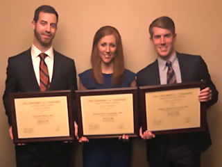 Two male and a female resident with grad certificates